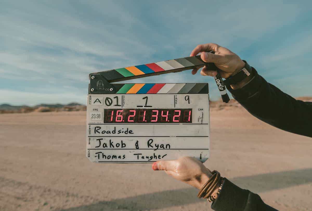 A film clap with desert on the background