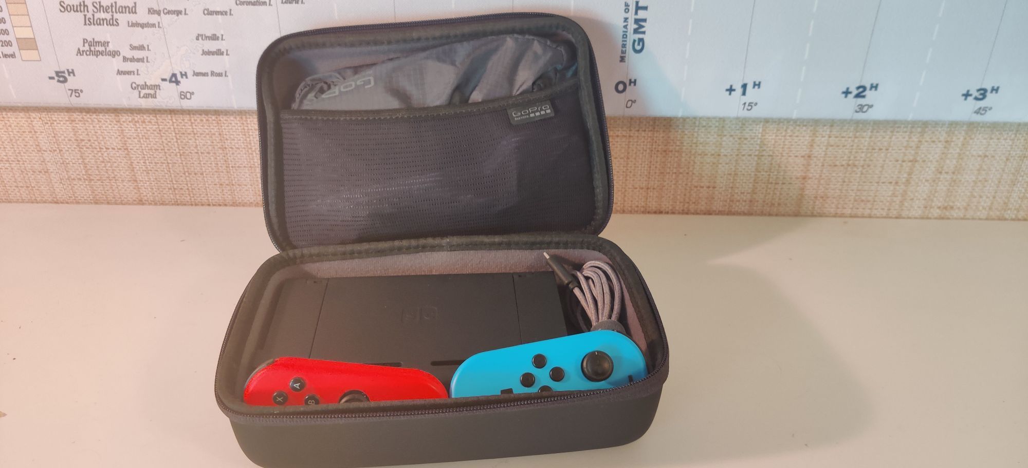 A GoPro case with Nintendo Switch packed into it