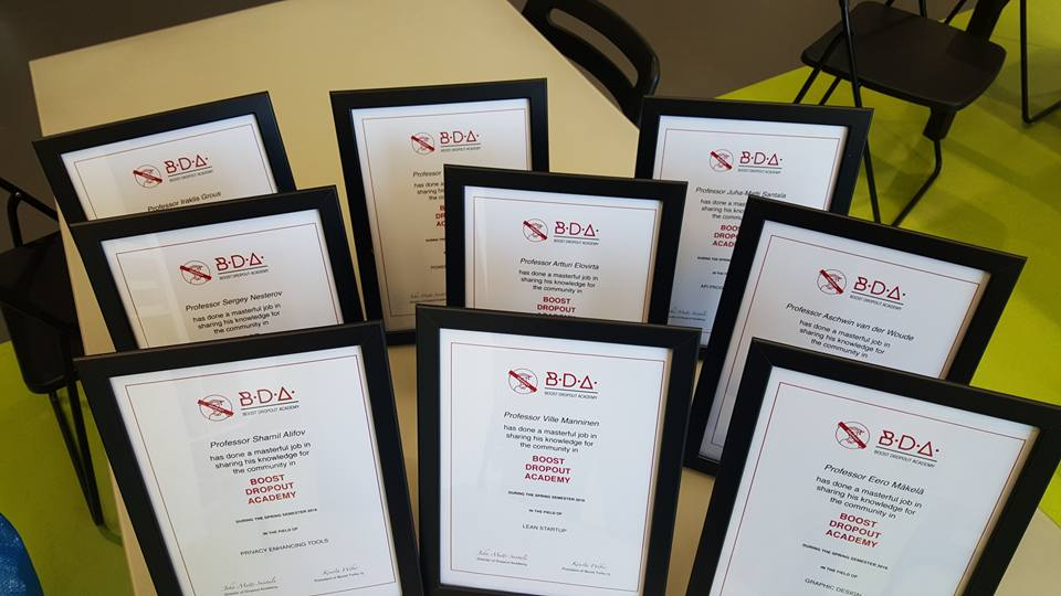 9 framed diplomas with Boost Dropout Academy logo