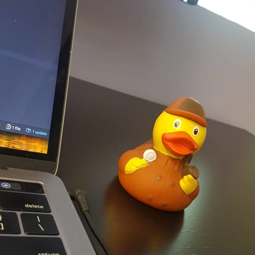A rubber duck painted to look like a detective
