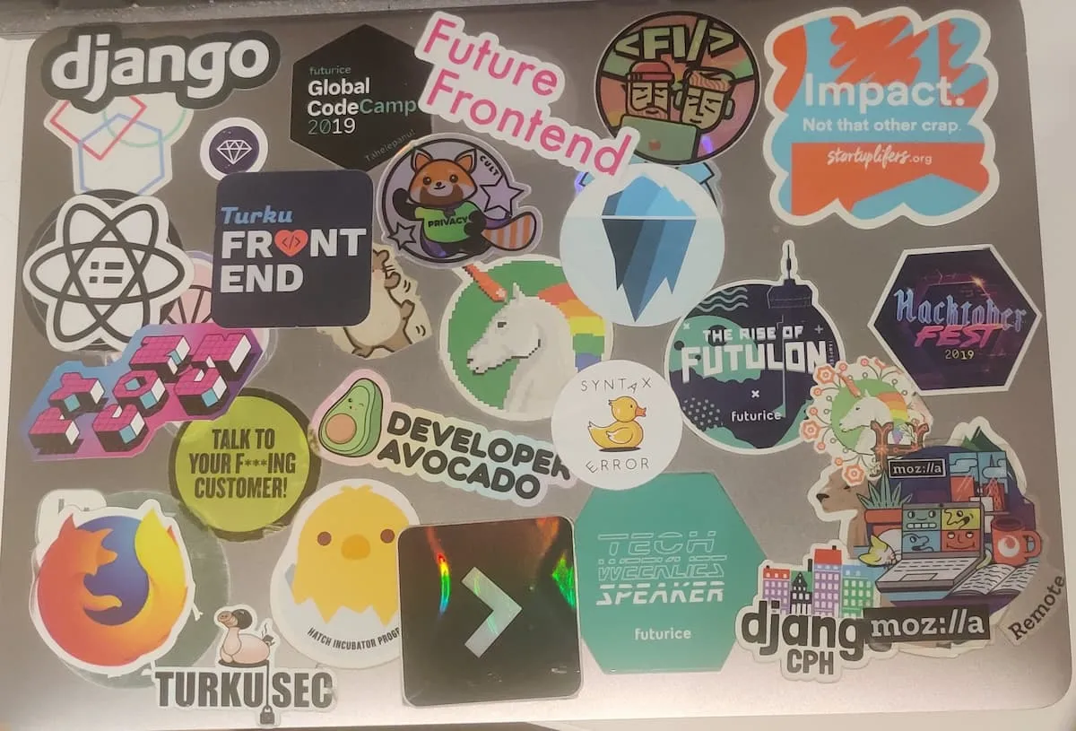 A Macbook cover with a ton of stickers 