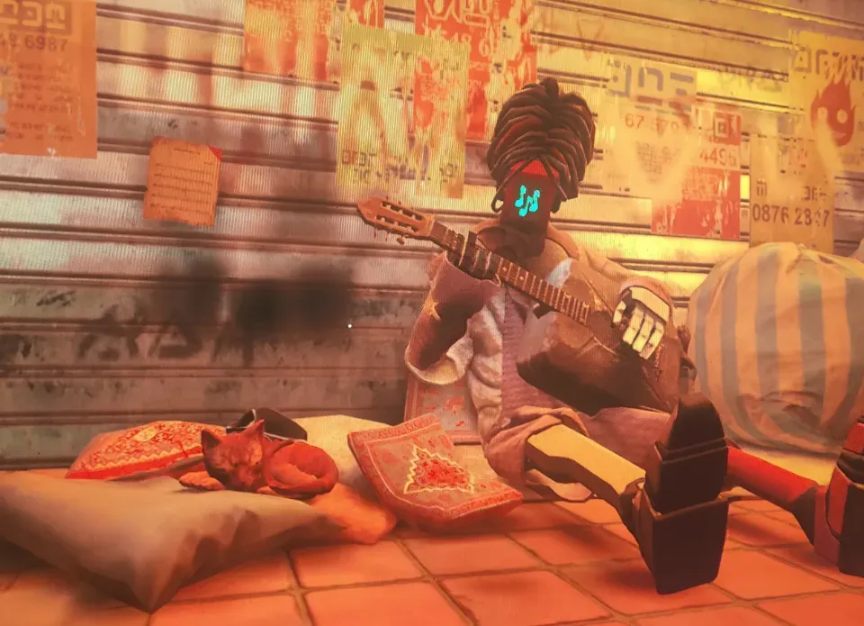 A cute, orange video game cat sleeping on a pillow next to a robot musician who is playing a makeshift guitar made from a gas canister. The robot's face is three music notes. They are both in front of a closed garage door that has bunch of posters and graffiti on it. 